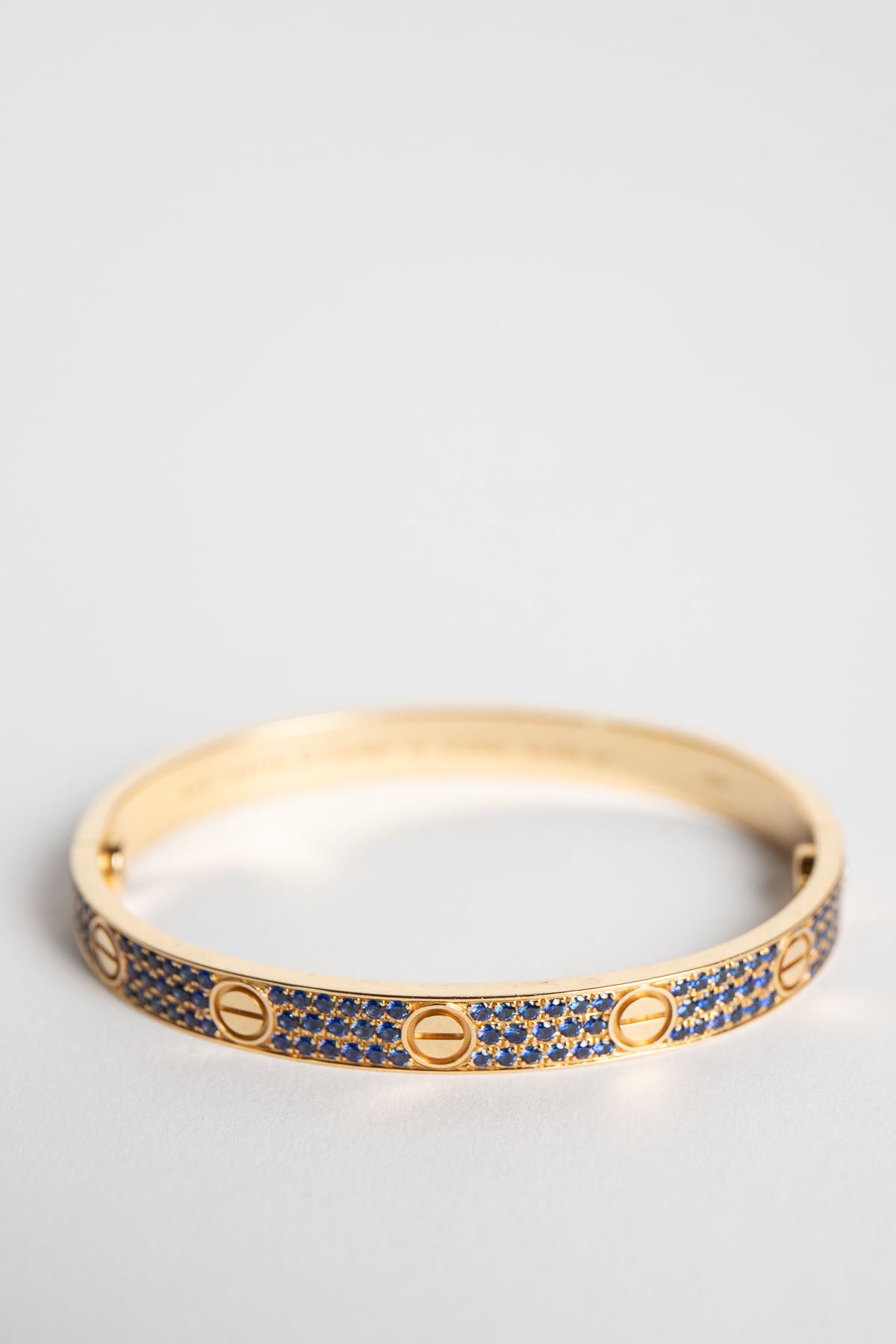 CARTIER | 18K YELLOW GOLD, SAPPHIRE LOVE BRACELET