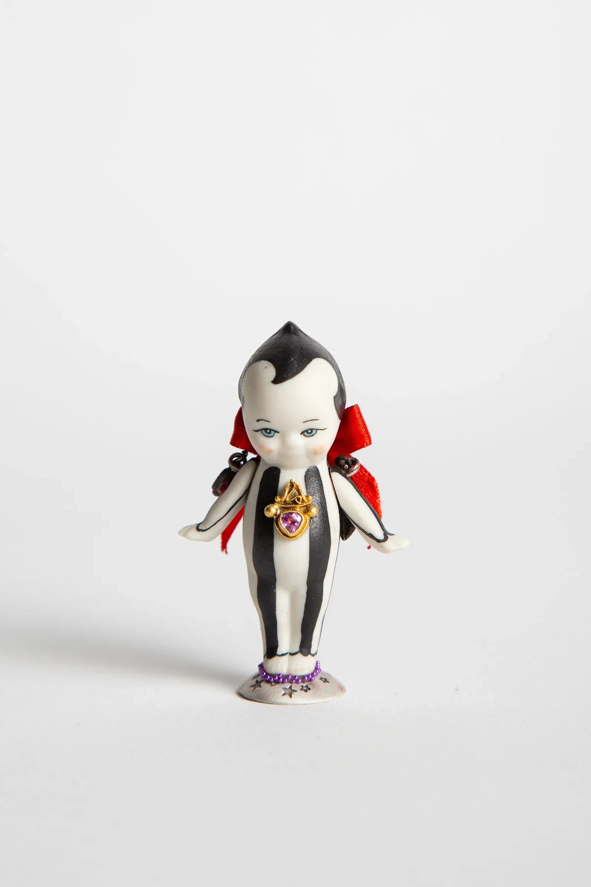 MELINDA RISK | KEWPIE DOLL PRIZE FIGURINE