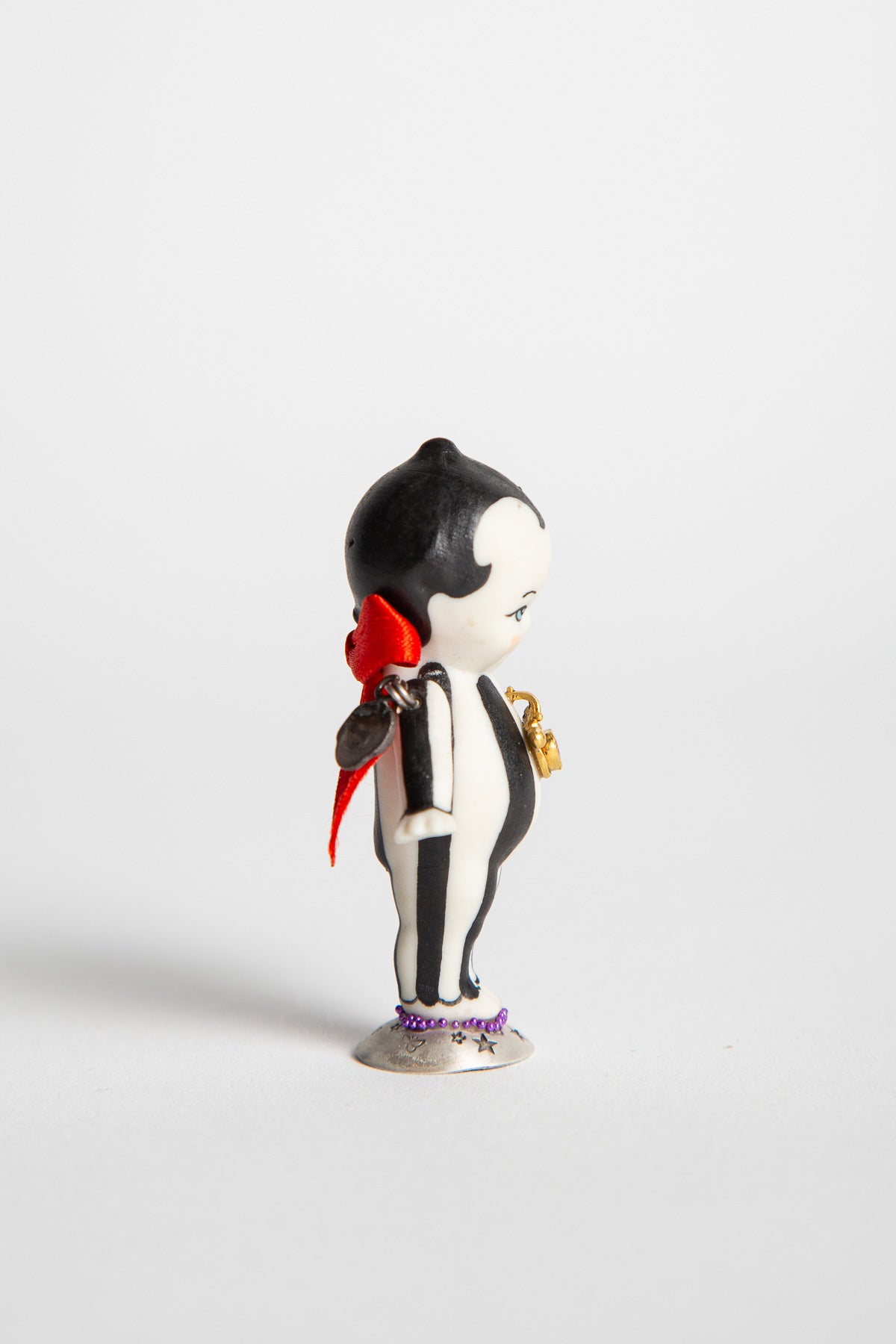 MELINDA RISK | KEWPIE DOLL PRIZE FIGURINE