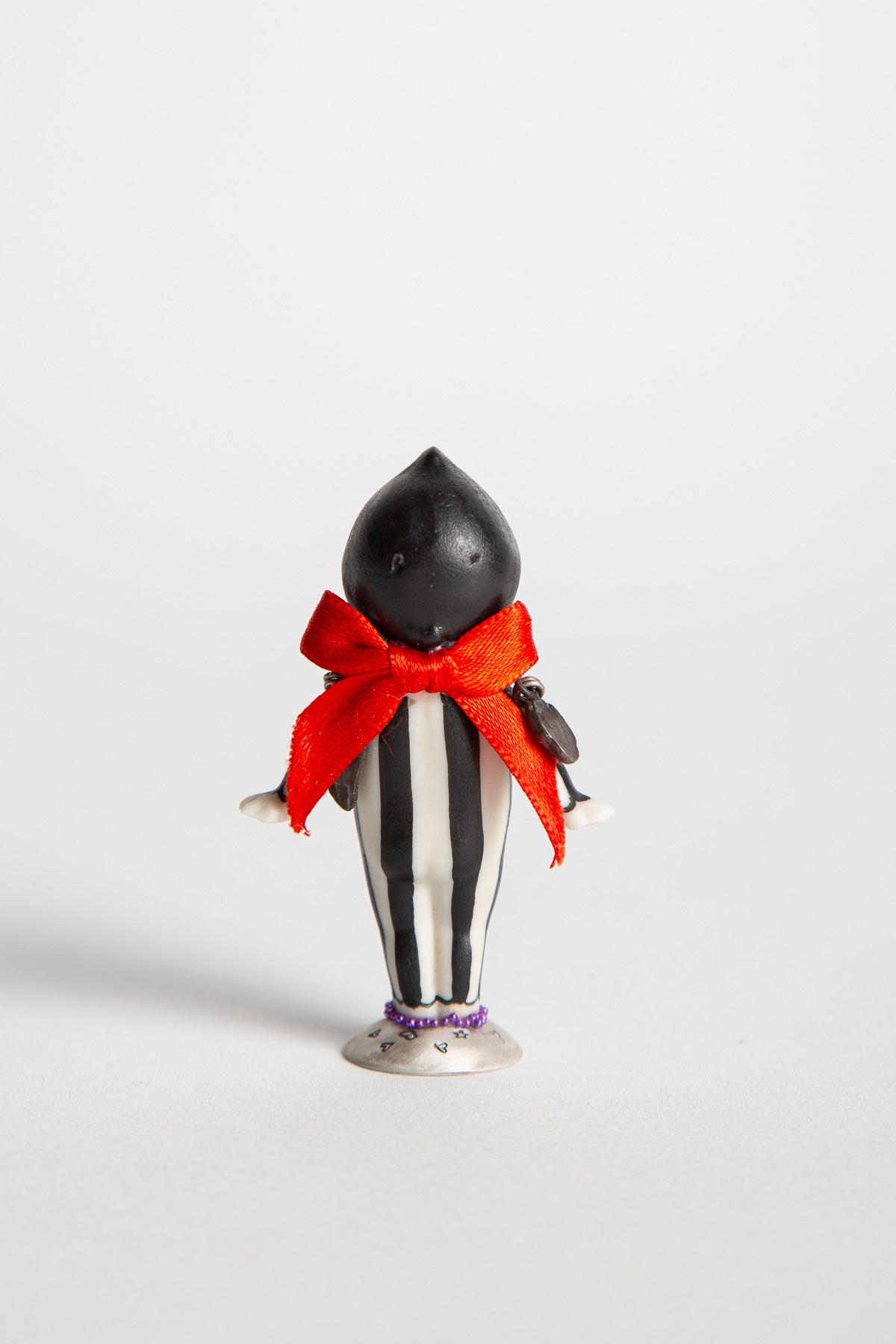 MELINDA RISK | KEWPIE DOLL PRIZE FIGURINE