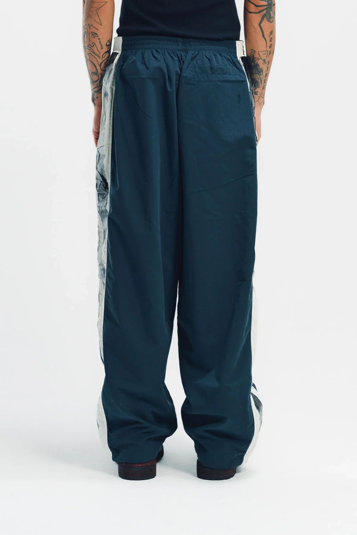 VETEMENTS | TAPED TRACK PANTS