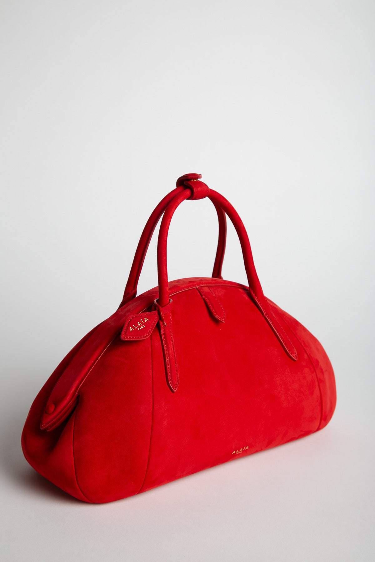 Alaïa | Purse Top Handle Bag in Nubuck