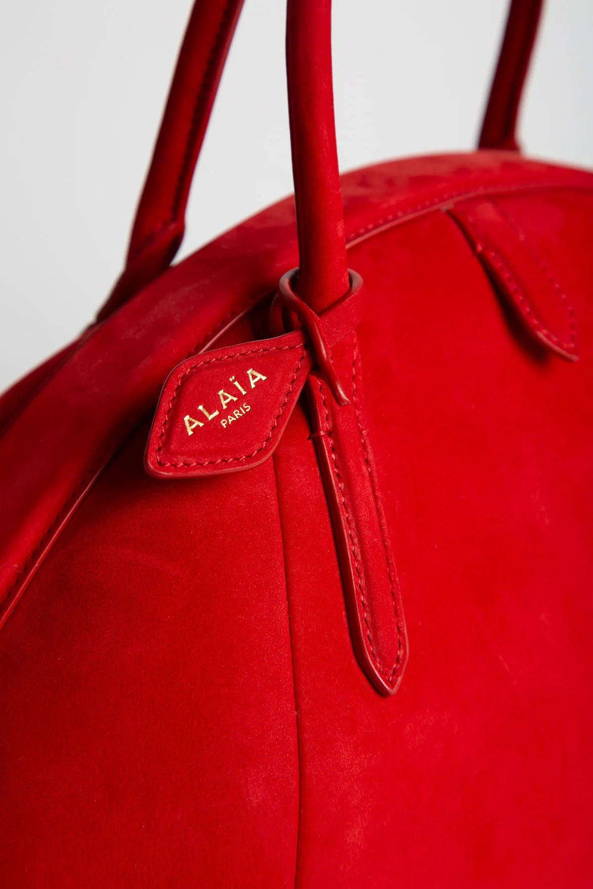 Alaïa | Purse Top Handle Bag in Nubuck