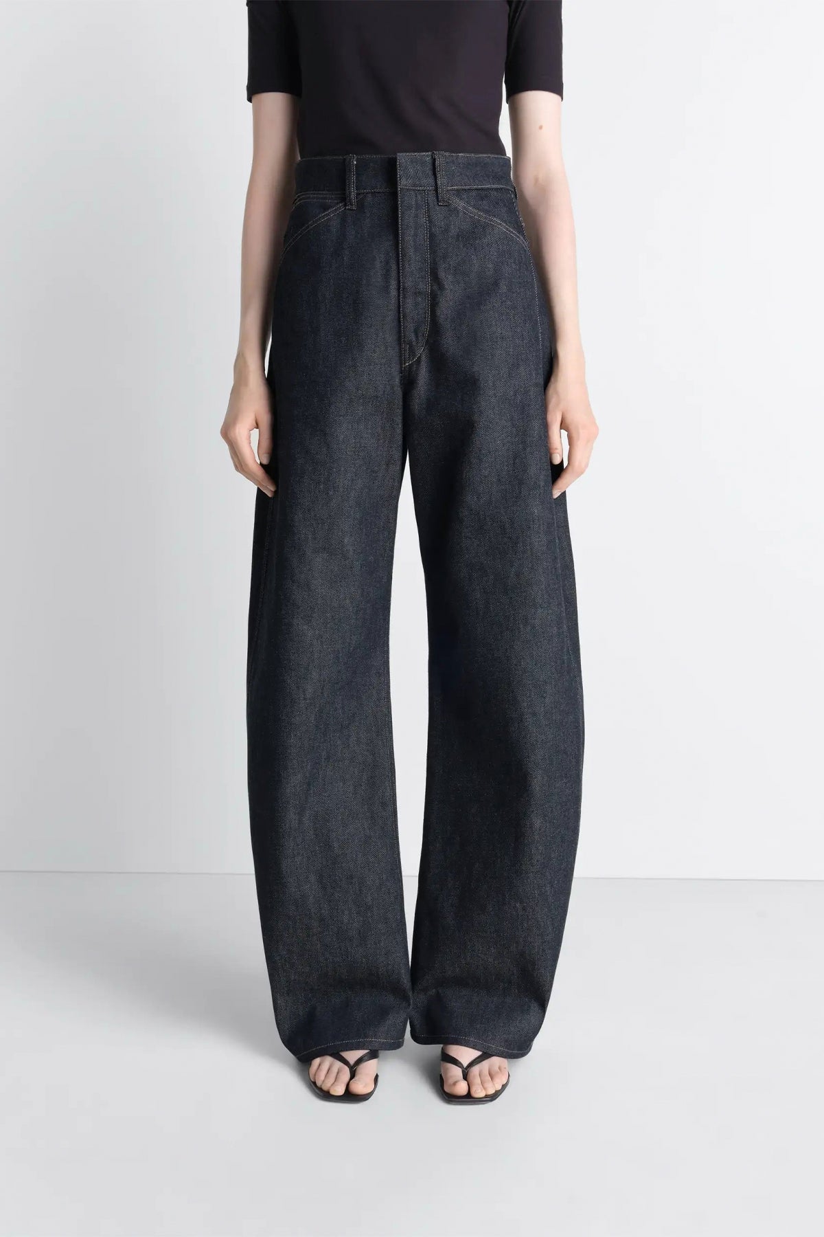 LEMAIRE | HIGH WAISTED CURVED PANTS IN DENIM