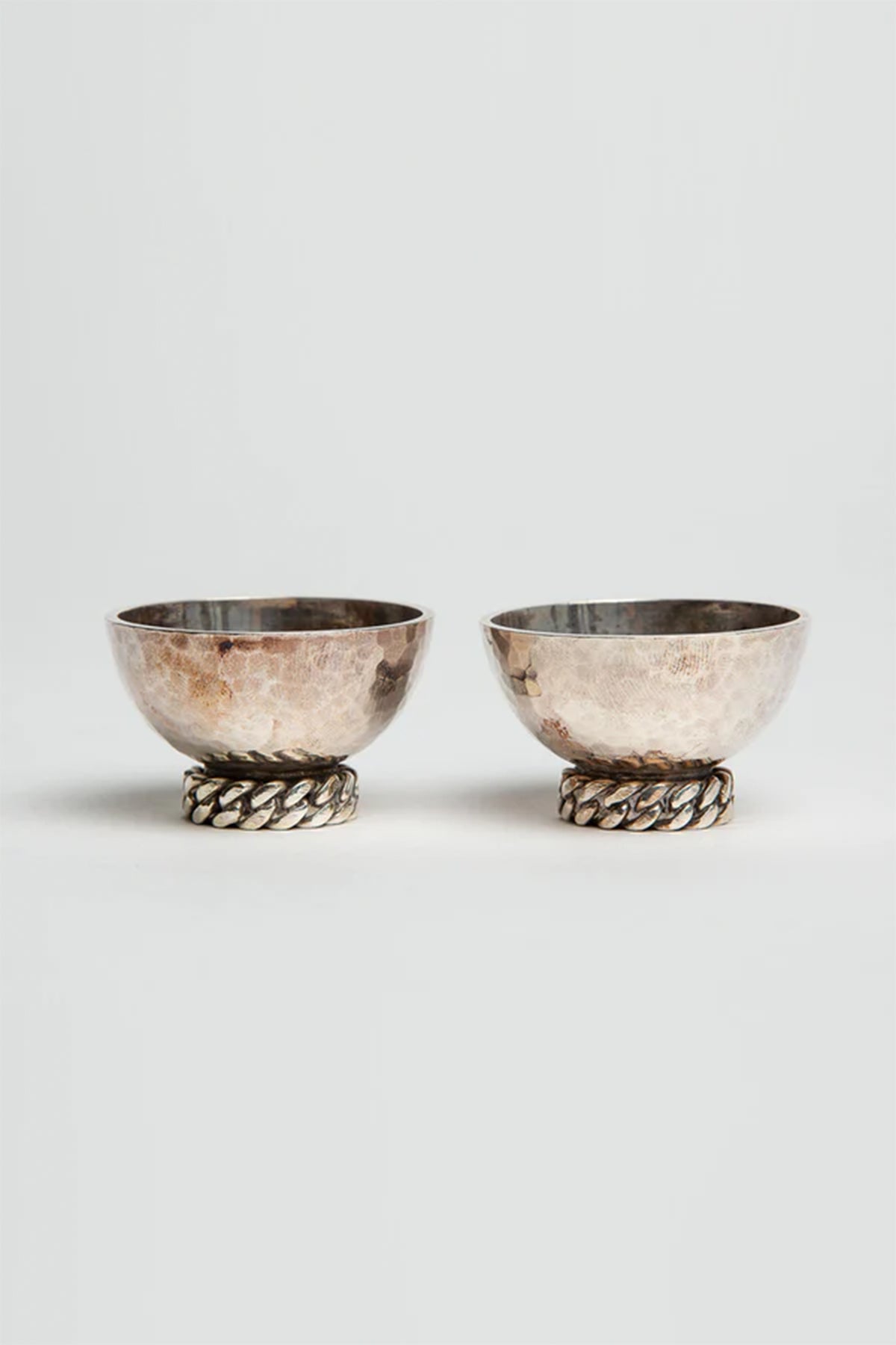 JEAN DESPRÉS | PAIR OF SILVER BOWLS WITH CHAINS