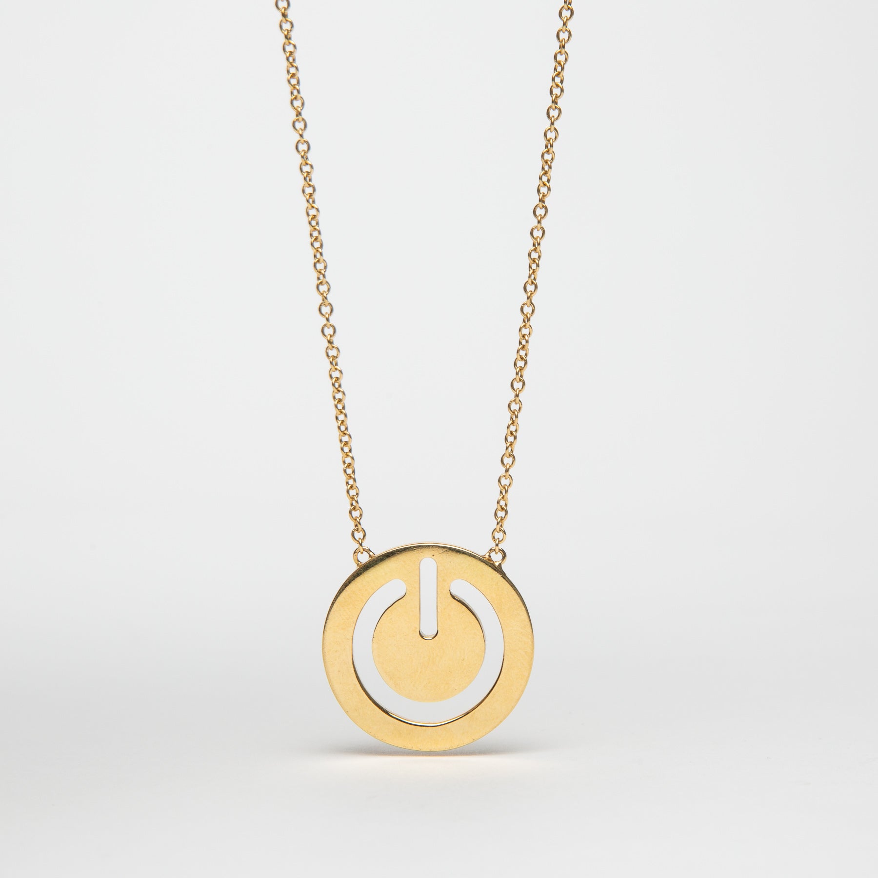 SARAH JANE WILDE | GOLD RESET SYMBOL NECKLACE