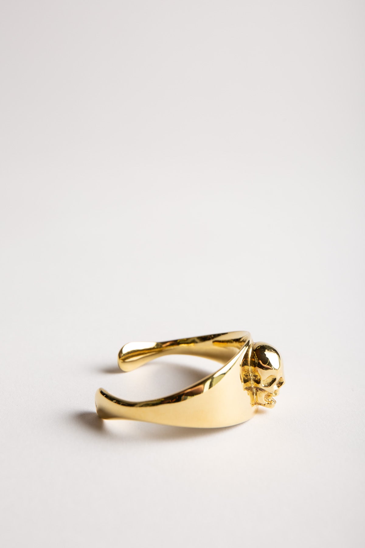 TOM BINNS | SMALL GOLD SKULL CUFF BRACELET - MAXFIELD LA