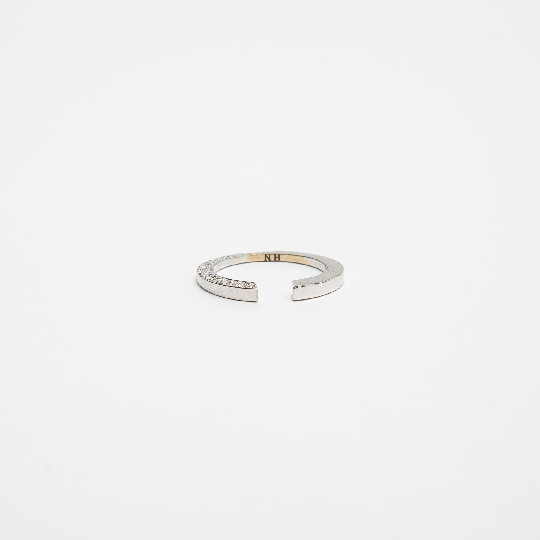 HADAR NORNBERG | HALF DIAMOND TITLED RING