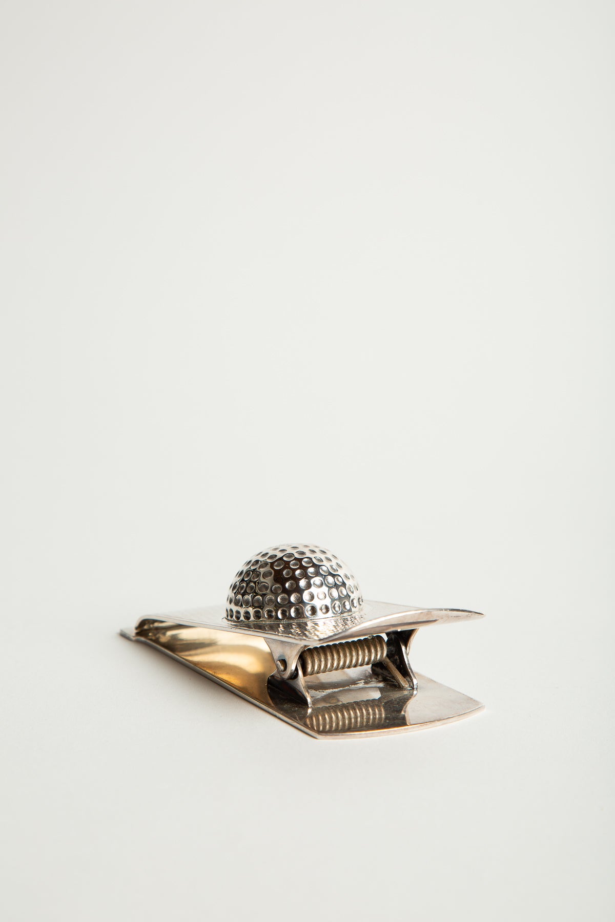 HERMÈS | 1960'S SILVER GOLF BALL PAPER CLIP