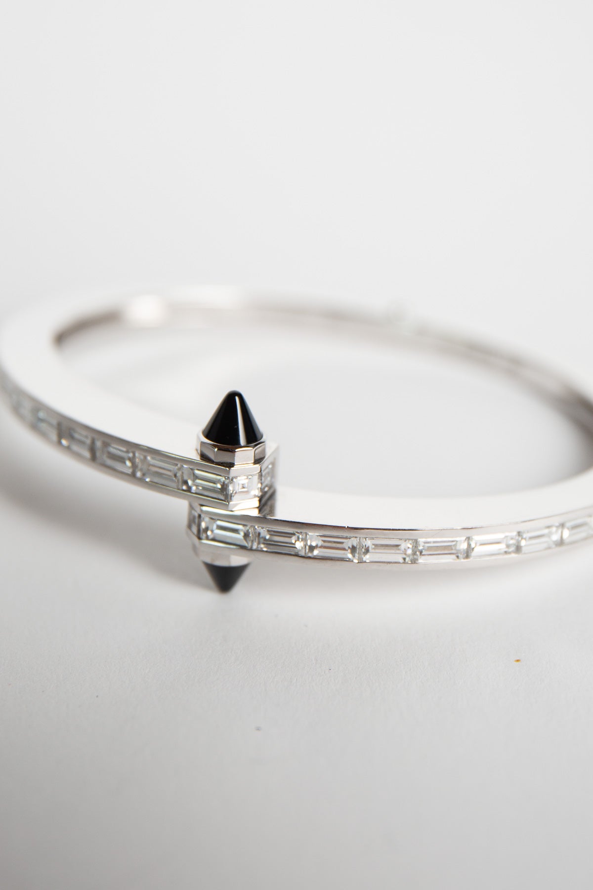 CARTIER | 1990'S WHITE GOLD, DIAMOND, ONYX BRACLET