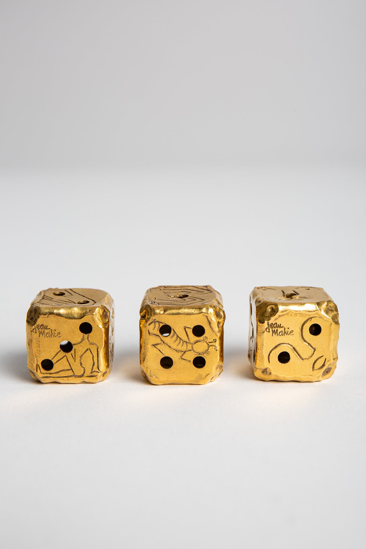 CARTIER | VINTAGE GOLD JEAN MAHIE DICE, SET OF 3