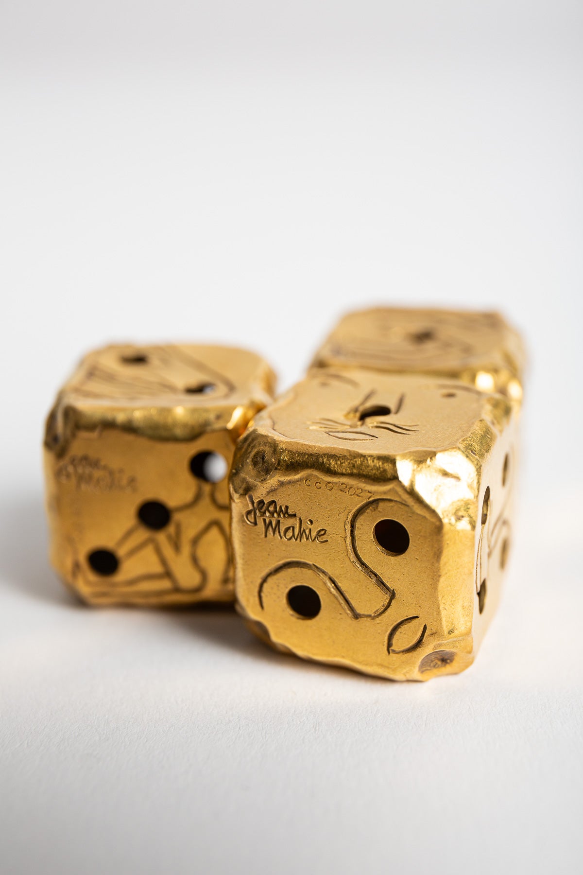 CARTIER | VINTAGE GOLD JEAN MAHIE DICE, SET OF 3