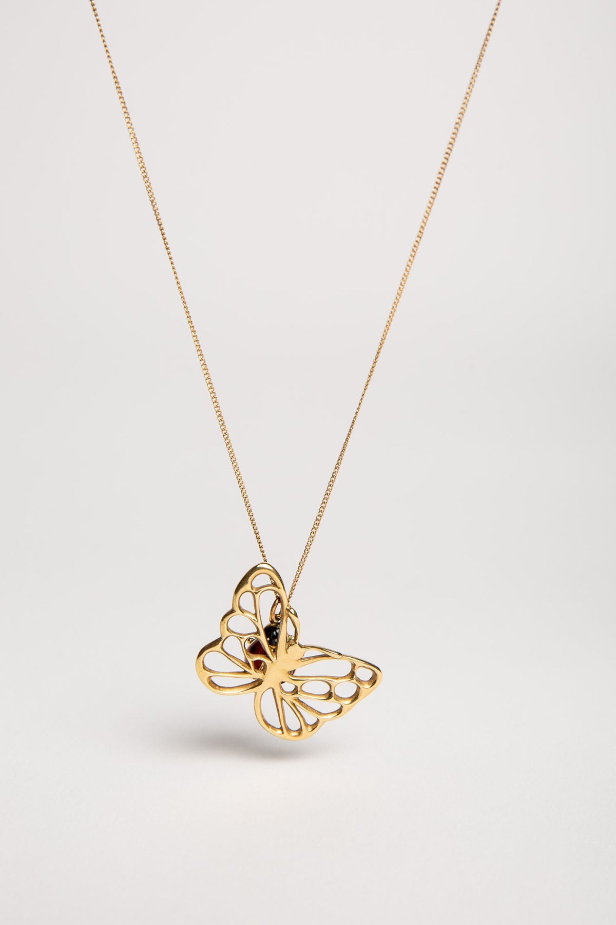 ANGELA CUMMINGS FOR TIFFANY & CO. | VINTAGE GOLD BUTTERFLY PENDANT WITH LADYBUG CHARM & CHAIN - MAXFIELD LA
