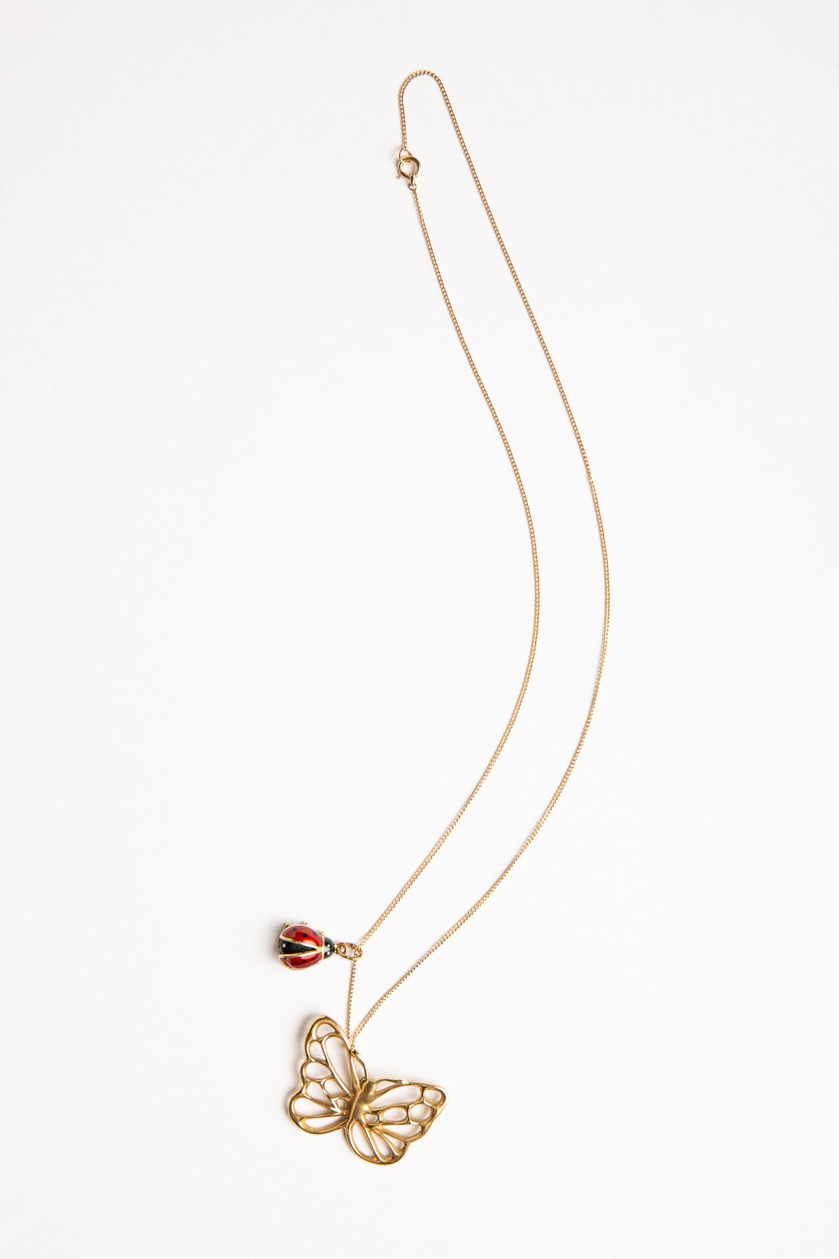 ANGELA CUMMINGS FOR TIFFANY & CO. | VINTAGE GOLD BUTTERFLY PENDANT WITH LADYBUG CHARM & CHAIN