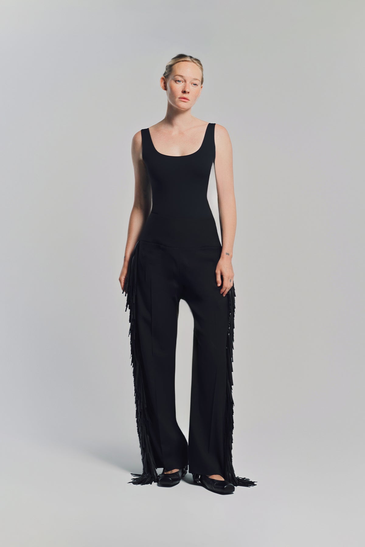 ALAÏA | FRINGED WOOL GABARDINE PANTS