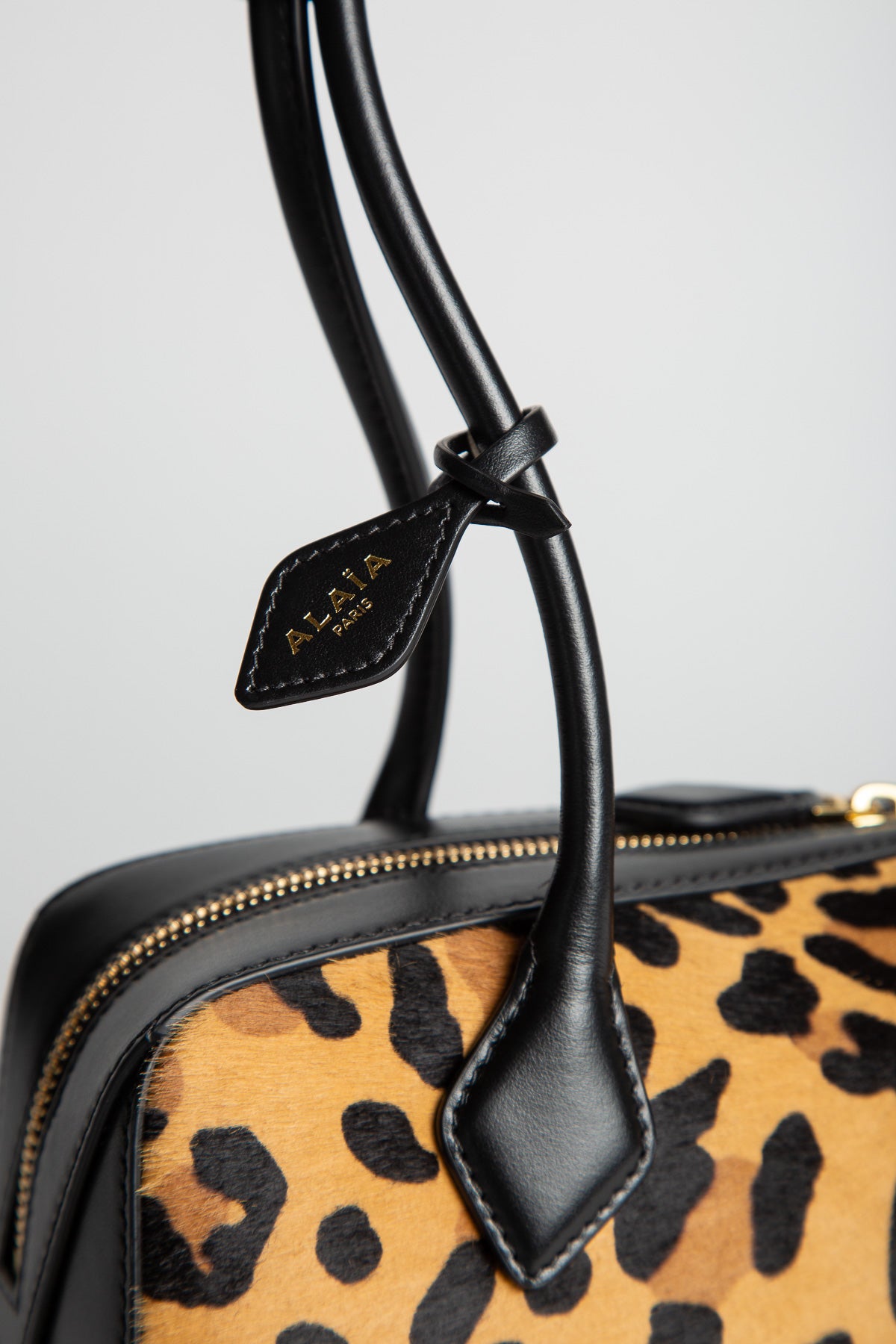 ALAÏA | LE TECKEL MEDIUM BAG IN LEOPARD HAIRCALF