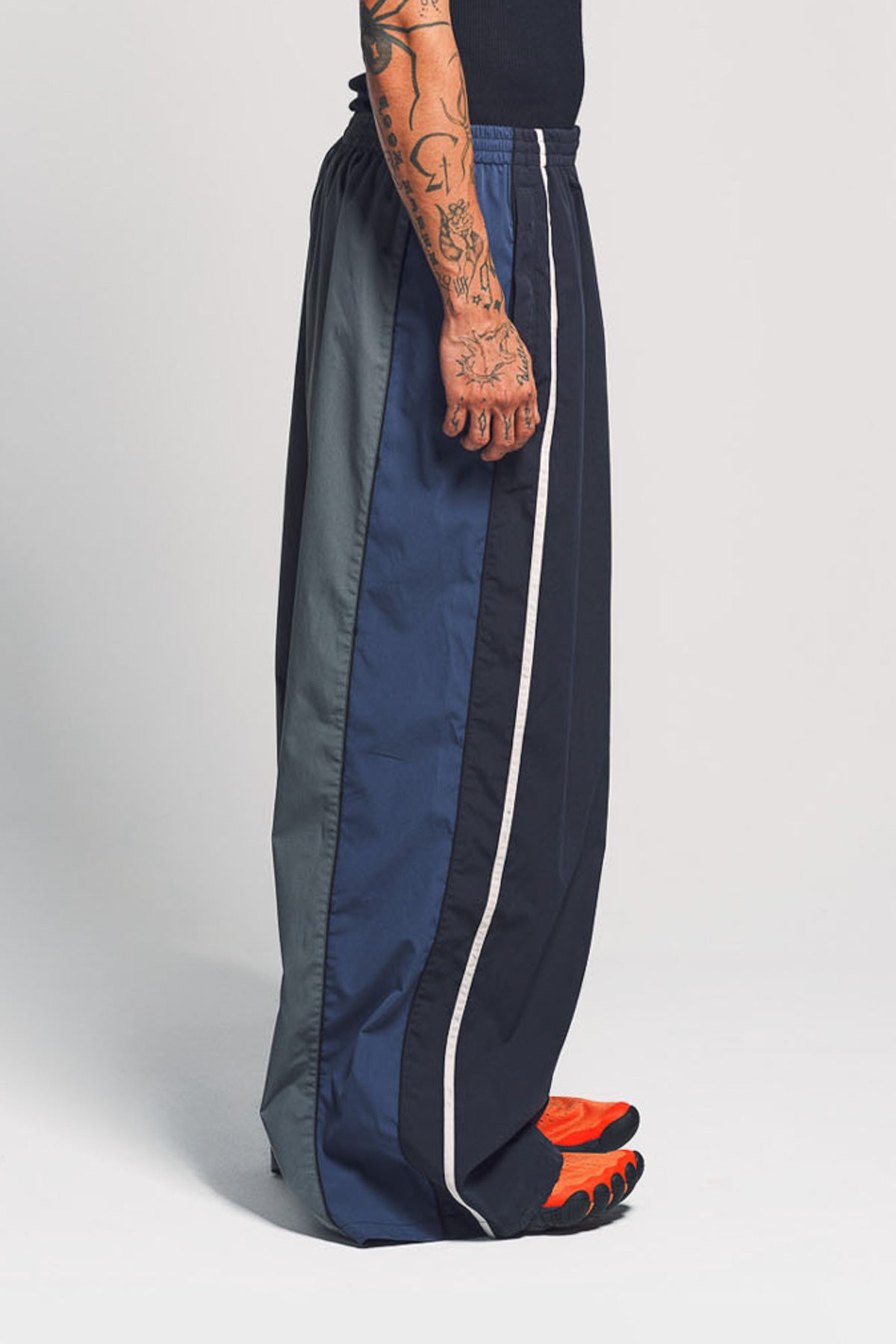BALENCIAGA | 50/50 TRACKSUIT PANTS