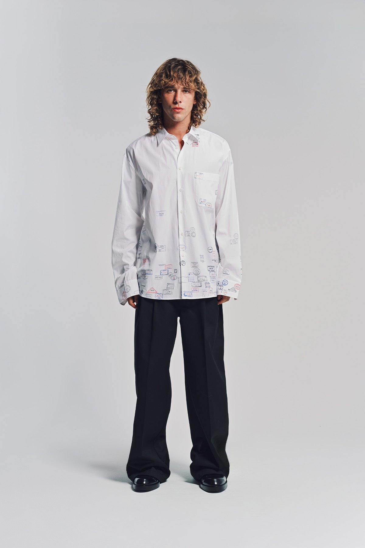 VETEMENTS | PASSPORT STAMPS LONG SLEEVE SHIRT
