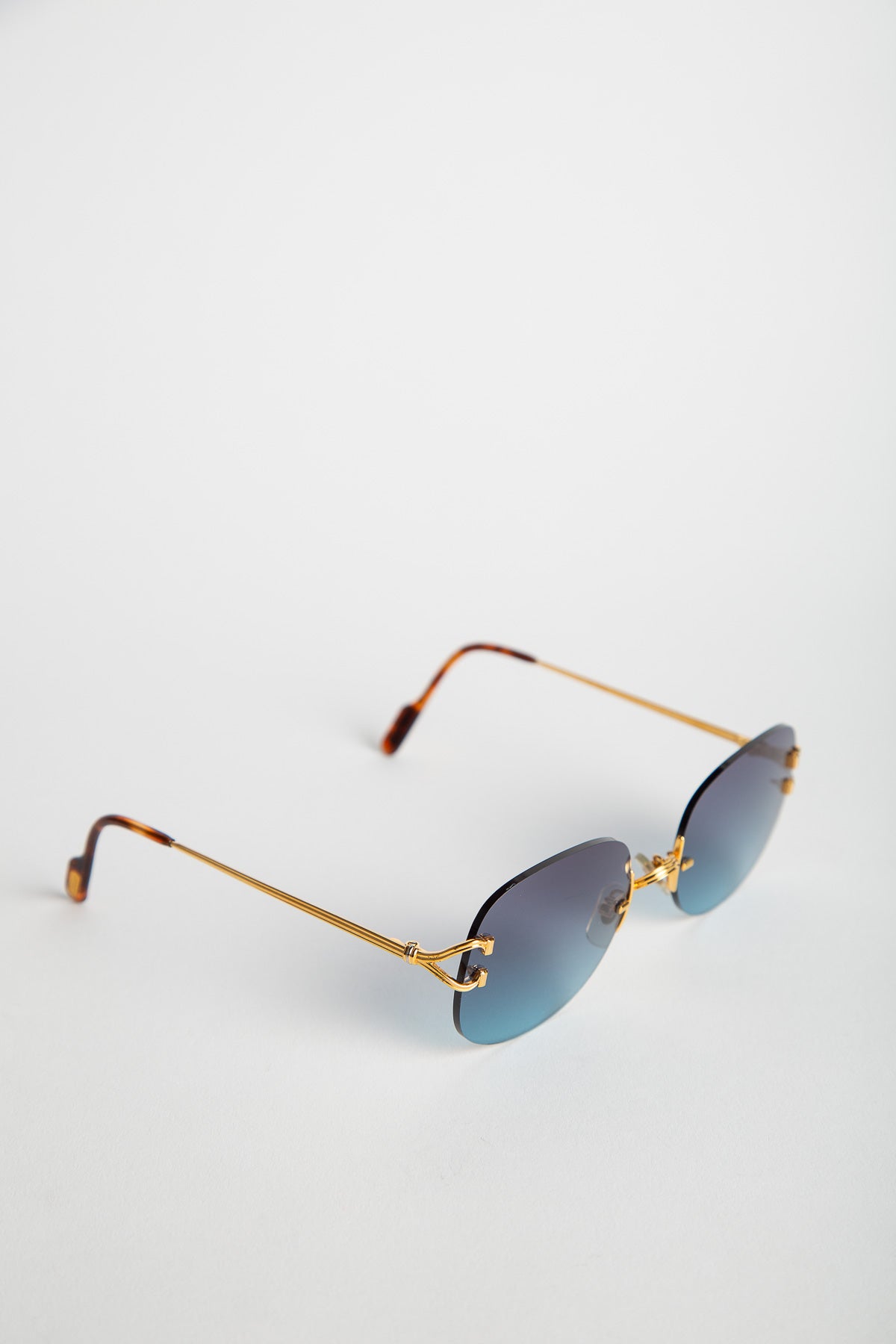 CARTIER YELLOW GOLD SERRANO RIMLESS SUNGLASSES