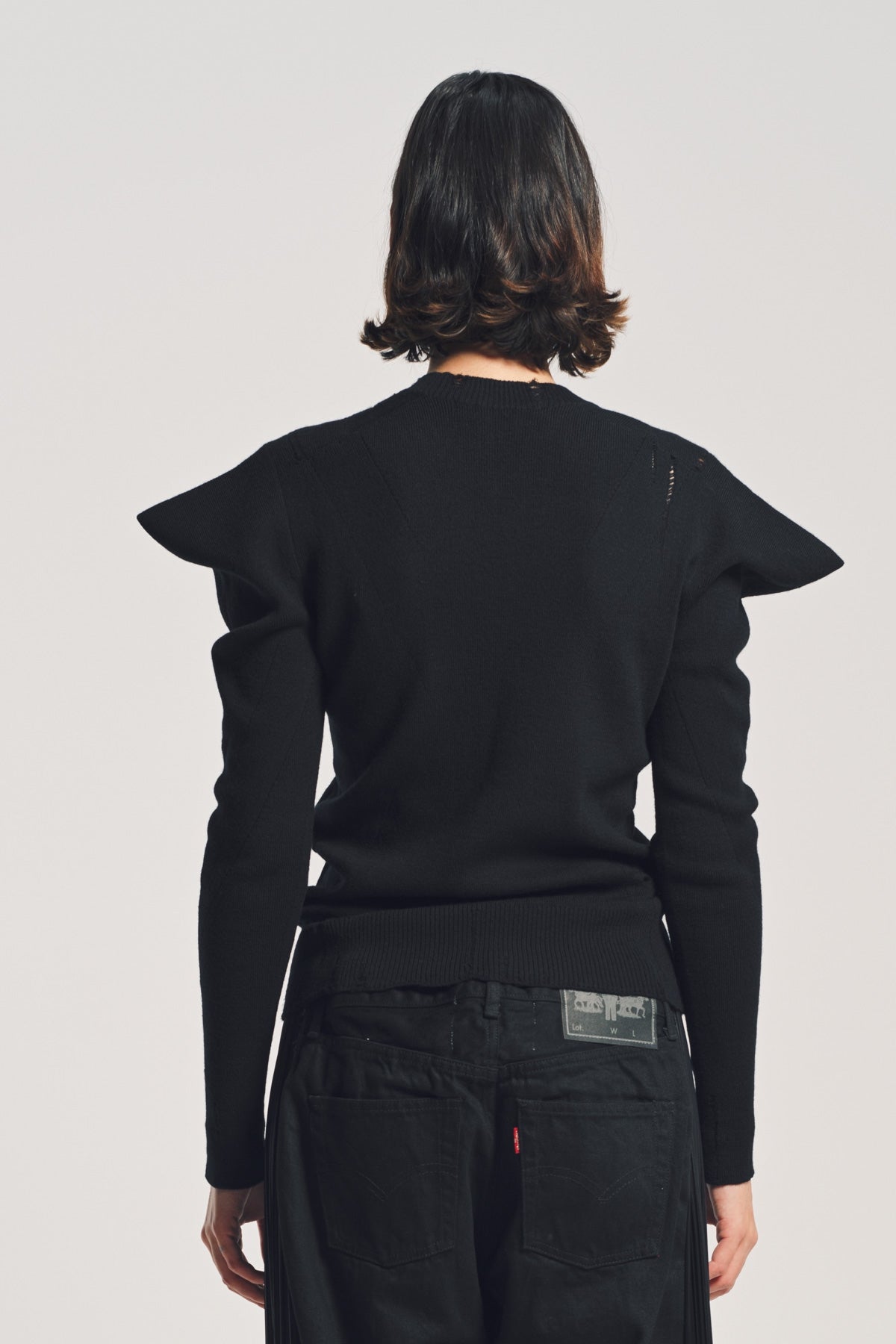 JUNYA WATANABE | DISTRESSED RIB SWEATER