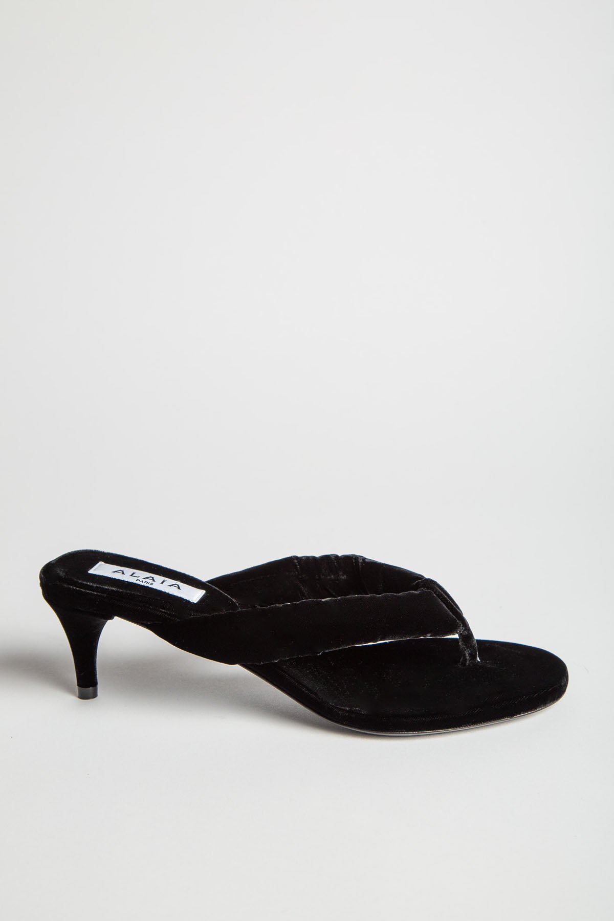 ALAÏA | HEEL THONG MULES IN VELVET
