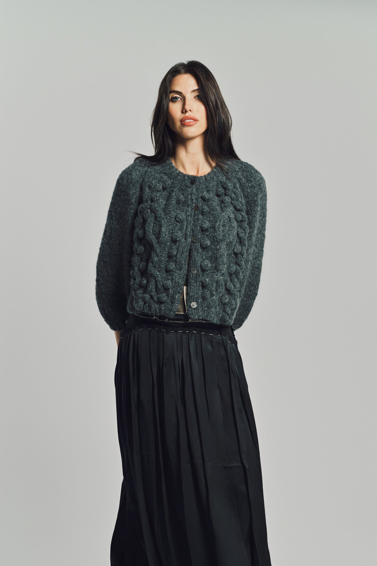 MERUERT TOLEGEN | CROSS PLEAT SLEVE CARDIGAN
