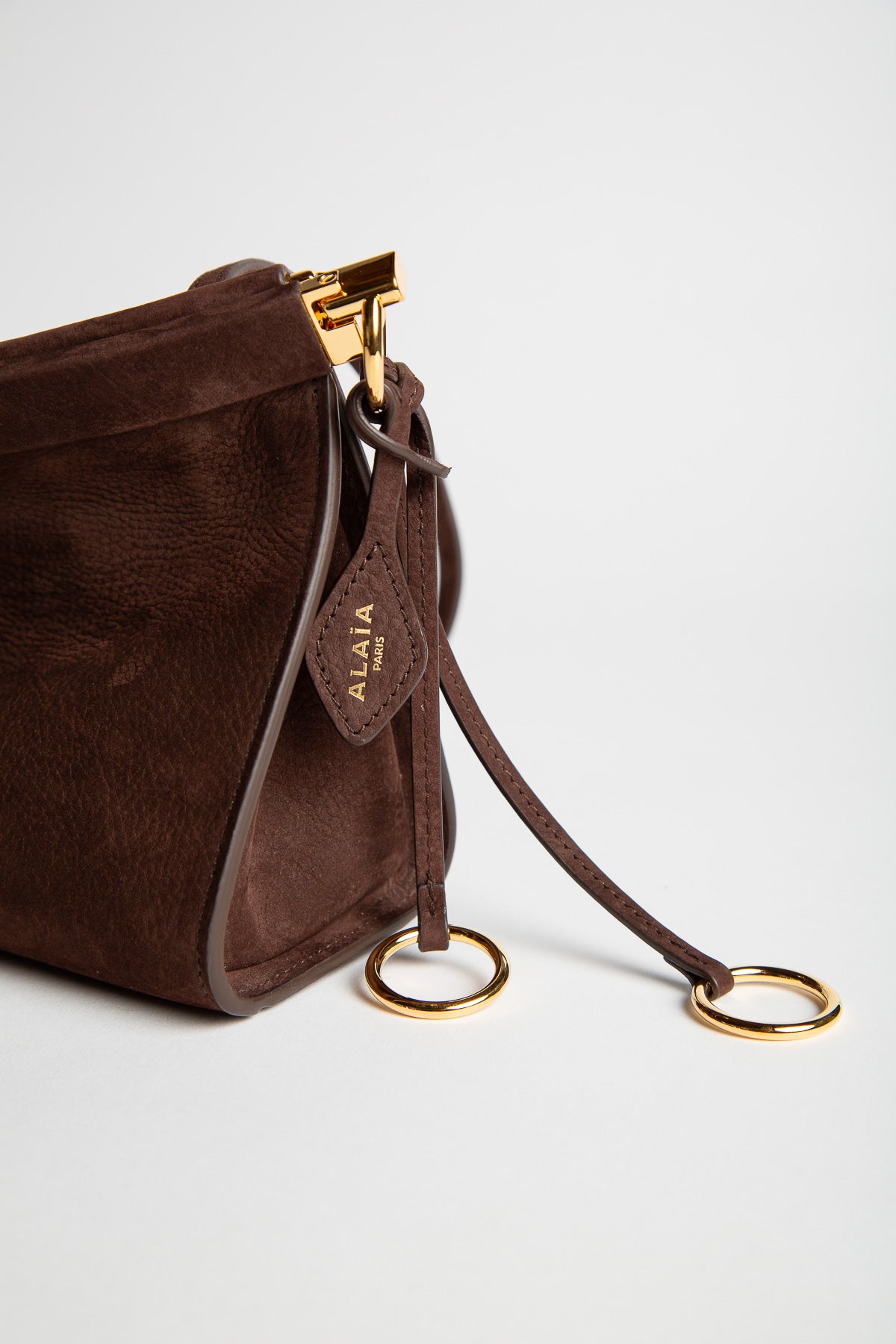 ALAIA | LE CLICK EAST WEST MEDIUM BAG IN NUBUCK