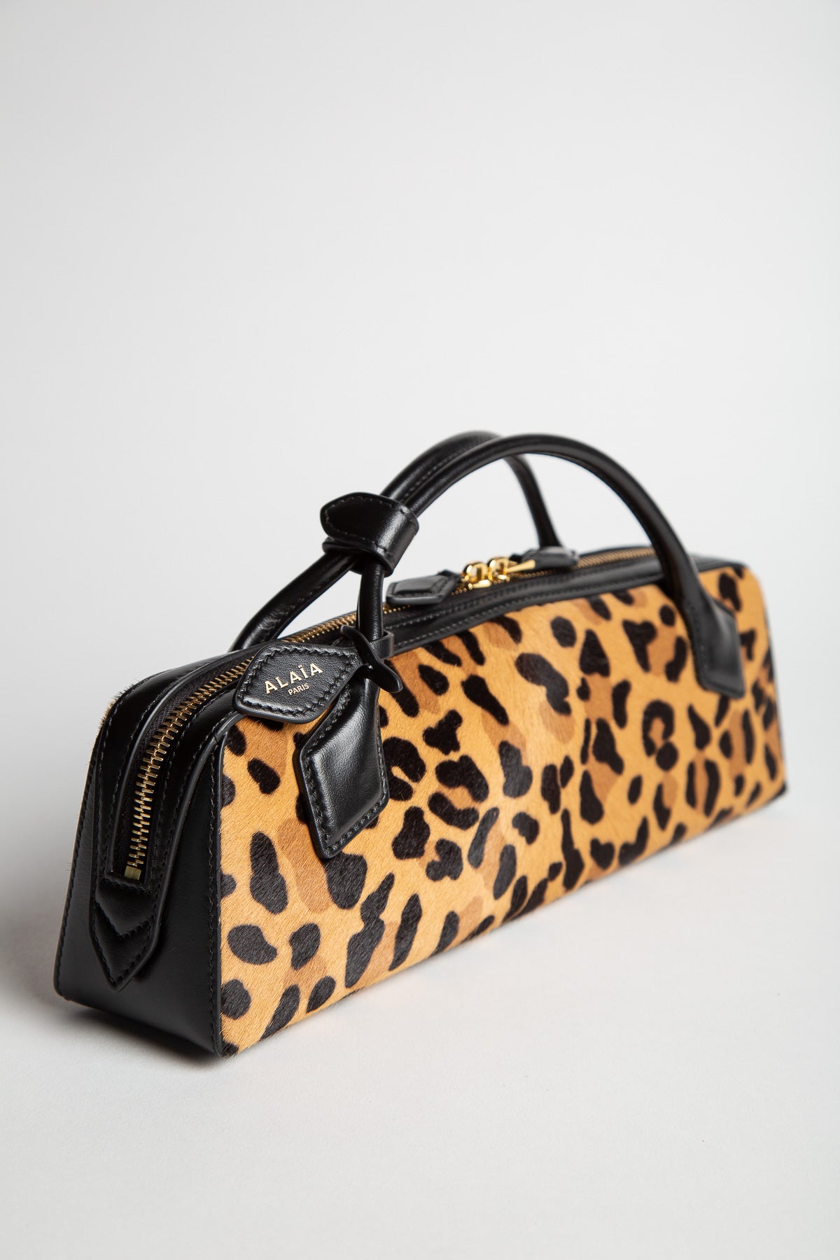 ALAIA | LE TECKEL CLUTCH IN LEOPARD HAIRCALF