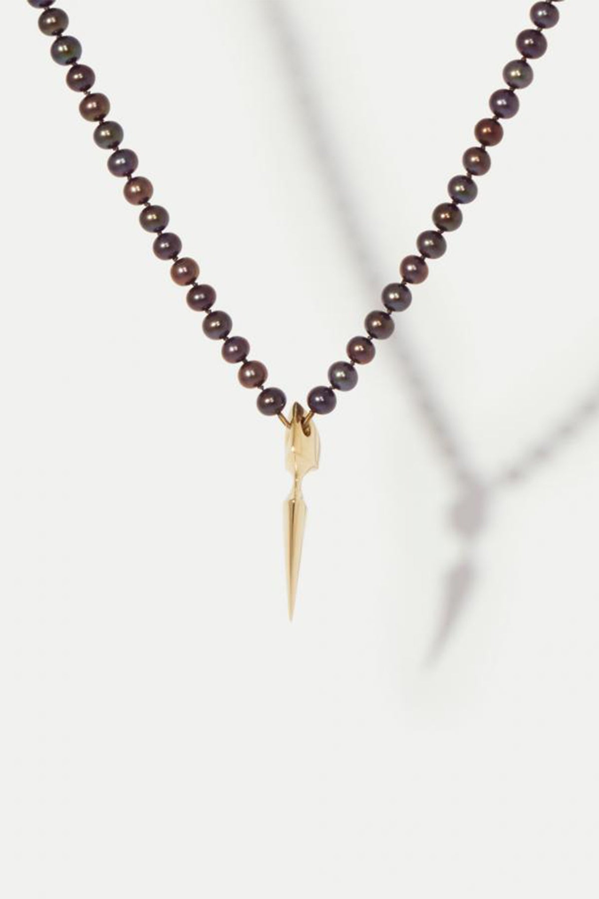 HANNAH MARTIN | SPUR YELLOW GOLD PENDANT ON PEARL NECKLACE