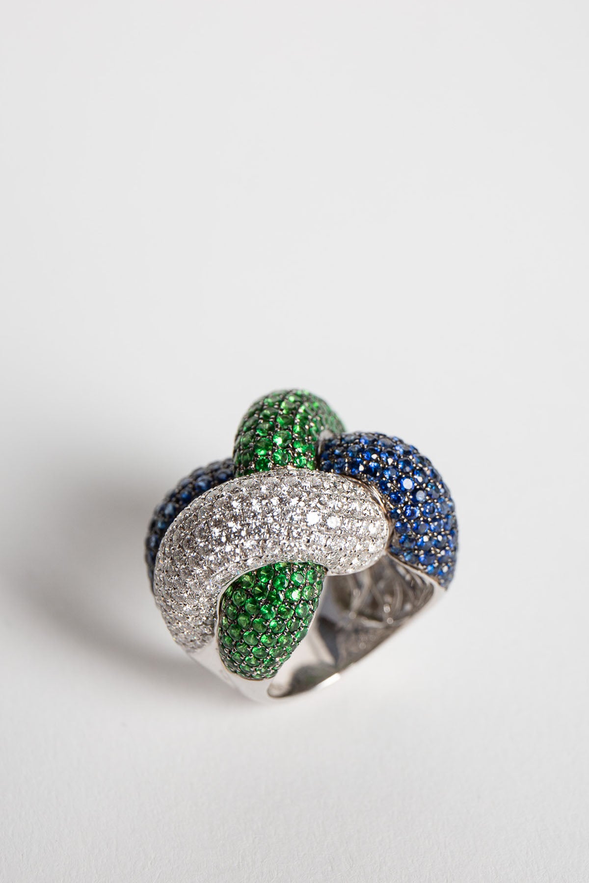 STEFERE | WHITE GOLD, DIAMOND, GREEN GARNET, BLUE SAPPHIRE KNOT RING