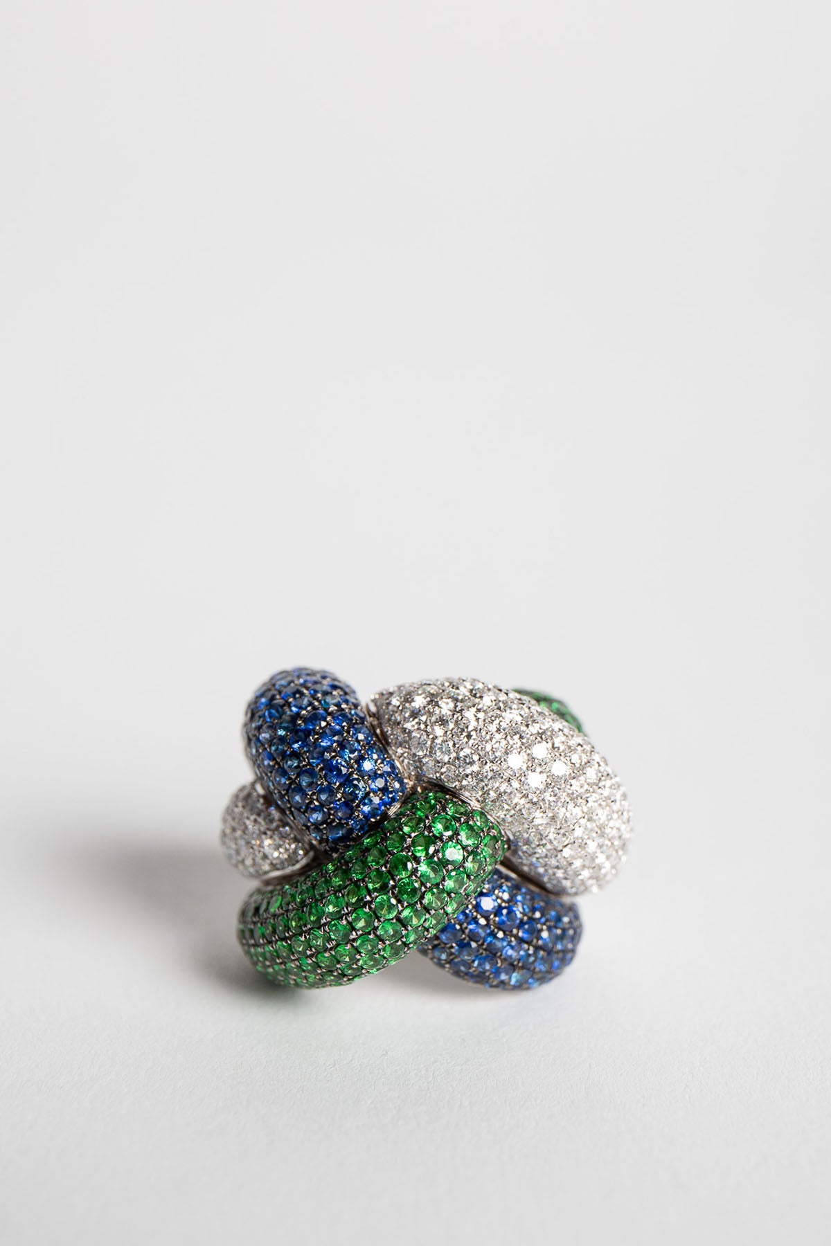 STEFERE | WHITE GOLD, DIAMOND, GREEN GARNET, BLUE SAPPHIRE KNOT RING