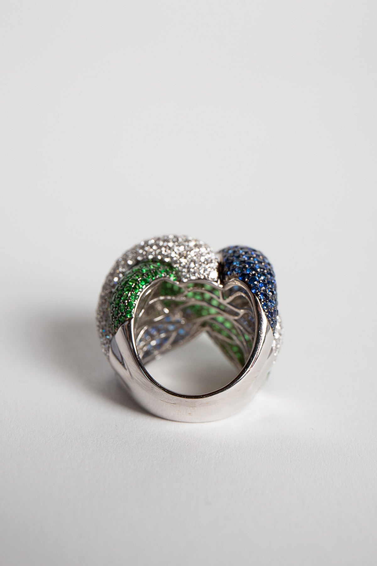 STEFERE | WHITE GOLD, DIAMOND, GREEN GARNET, BLUE SAPPHIRE KNOT RING