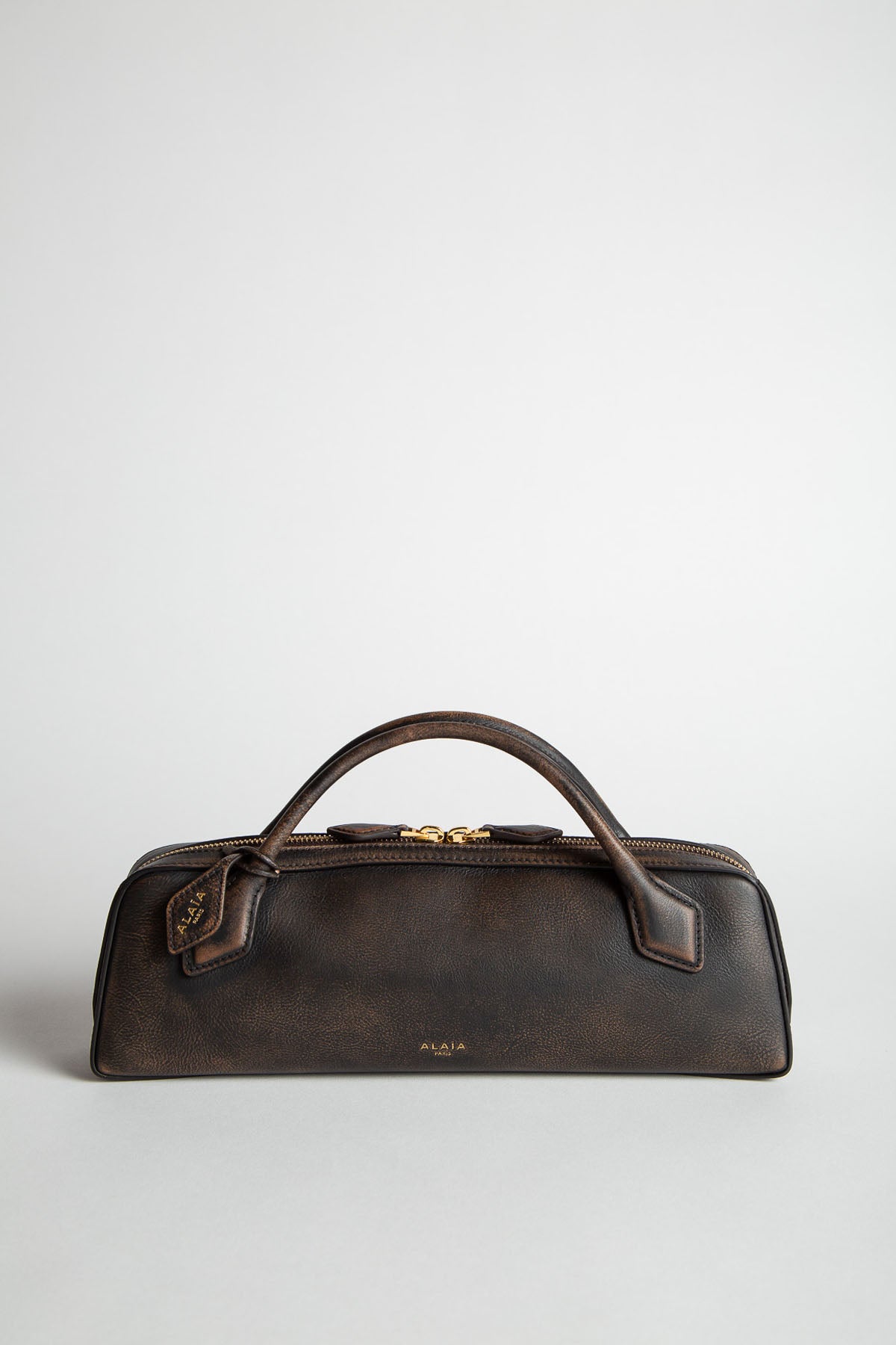 ALAIA | LE TECKEL CLUTCH IN SUEDE GOATSKIN