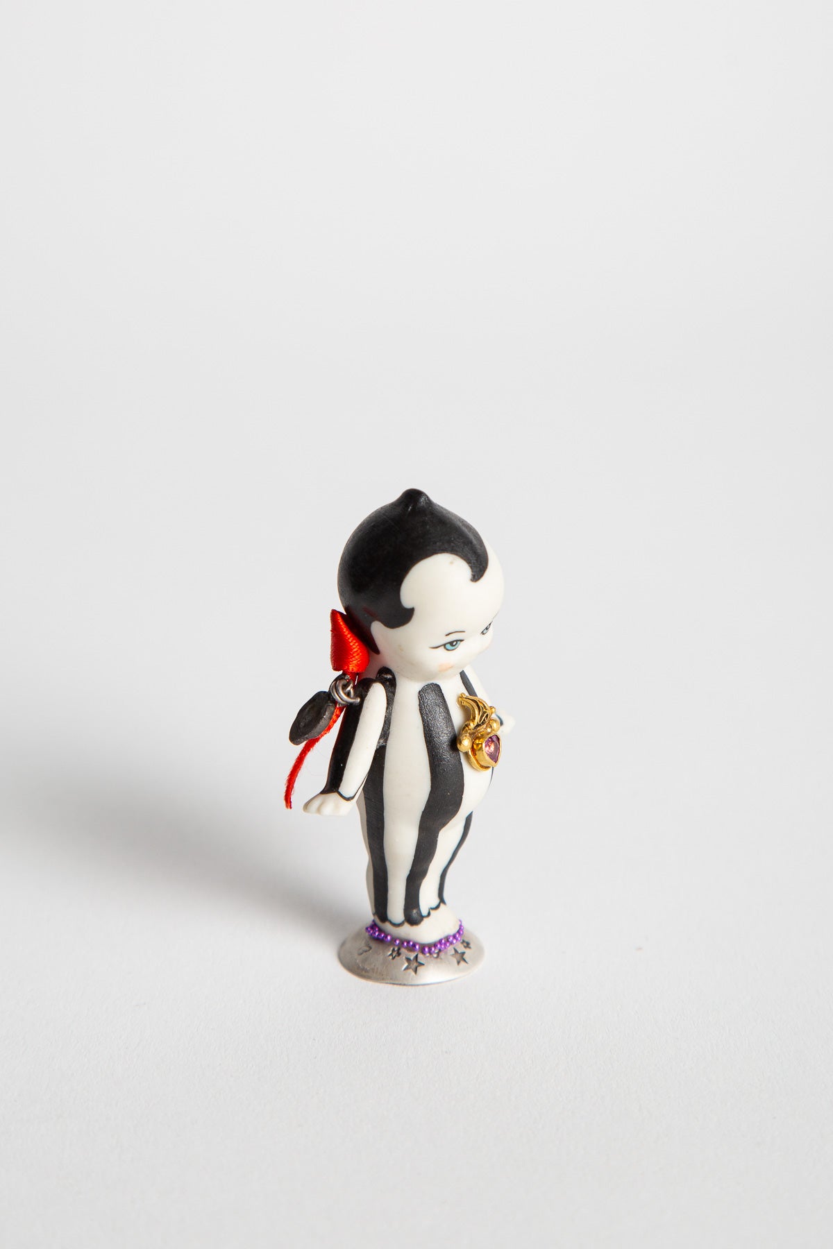 MELINDA RISK | KEWPIE DOLL PRIZE FIGURINE