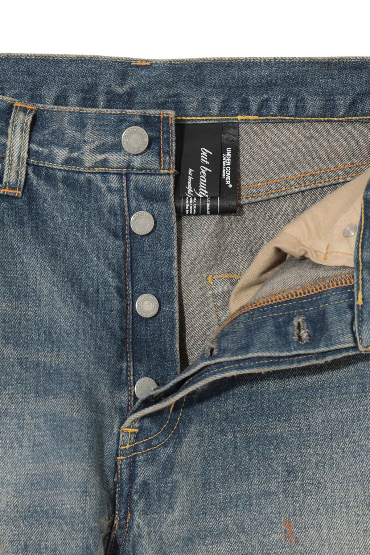 UNDERCOVER | RIPPED JEANS