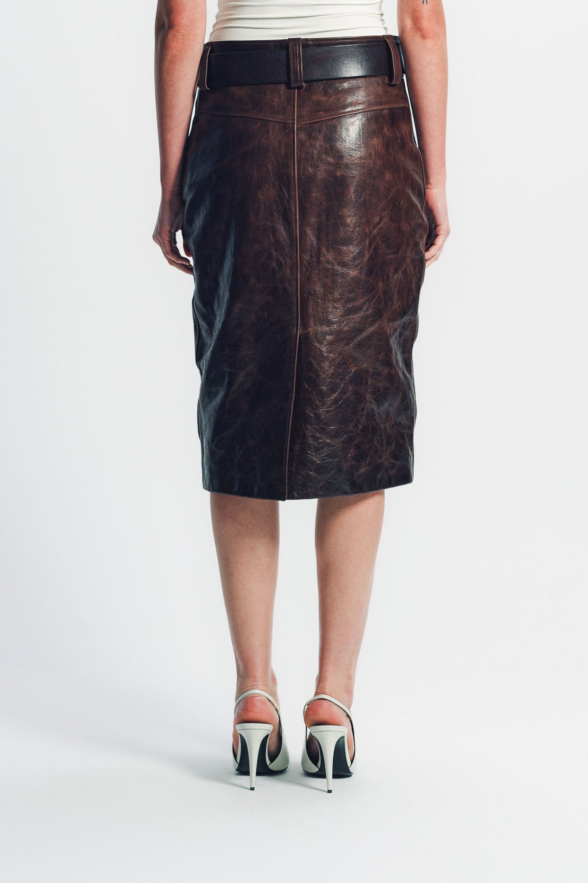 SAINT LAURENT | BELTED PENCIL SKIRT IN CREASED LEATHER