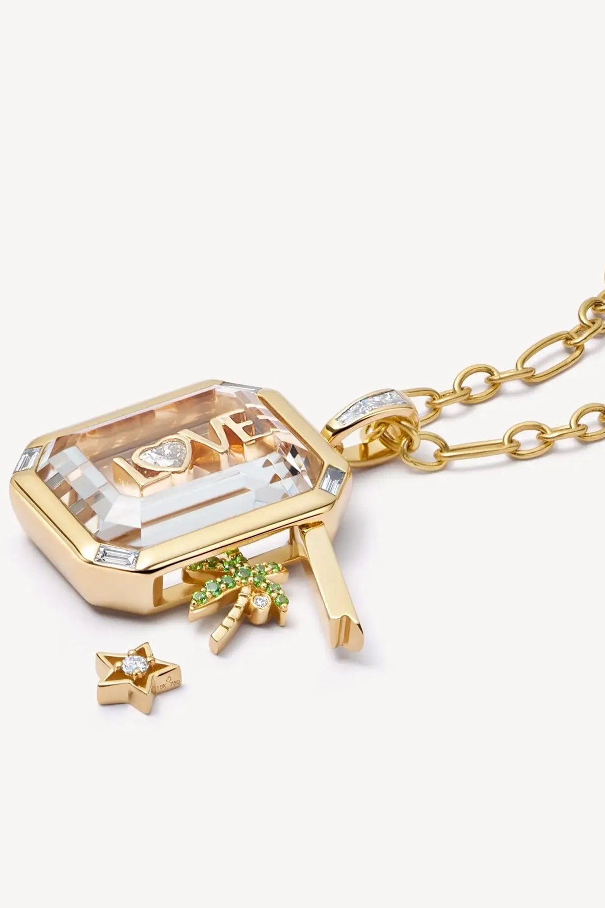 LOQUET LONDON | 18K QUATTRO BAGUETTE LOCKET