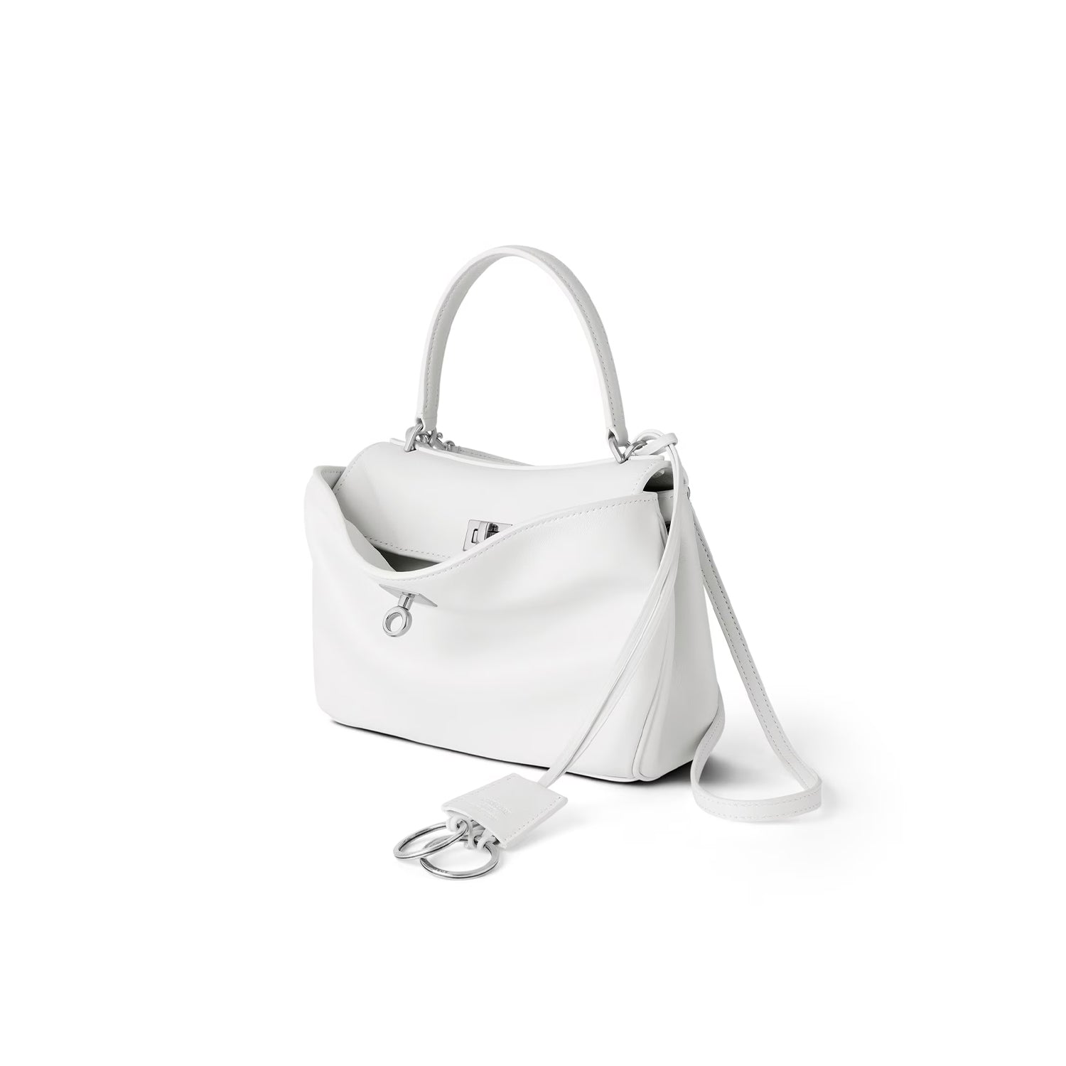 White blaneciaga rodeo handbag with a strap on a white background