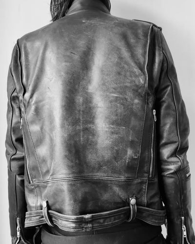 Person with Leather Rick Owens Jacket on. Camera focusing on detail.