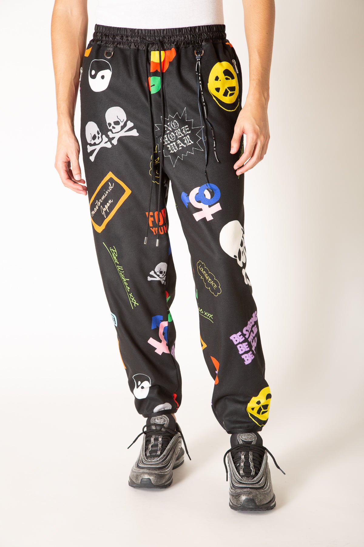 MASTERMIND | ALL OVER MOTIF TRACK PANTS